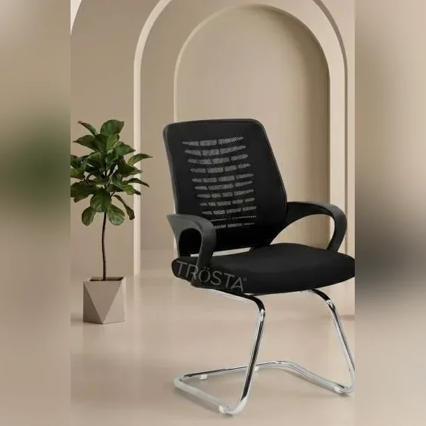 Black mesh cantilever visitor chair with chrome frame